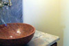 The Guest Bath Features a Marble Sink