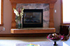 Pink Granite and a Floating Hearth Enhances this Living Room Fireplace