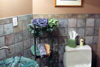 This Guest Bathroom Features a Unique Glass Sink