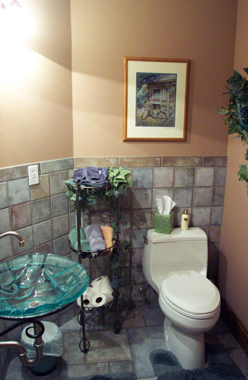 This Guest Bathroom Features a Unique Glass Sink