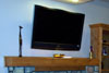 Recreation Room - Fireplace Mantle with a Wall Mounted TV