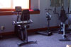 Exercise Room with Mirrored Walls and Access to the Outside