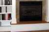 Guest Bedroom With a Fireplace