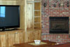 Recroom with Built-in Cabinets and Brick Fireplace