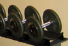 Exercise Room With Rubberized Floor And TV